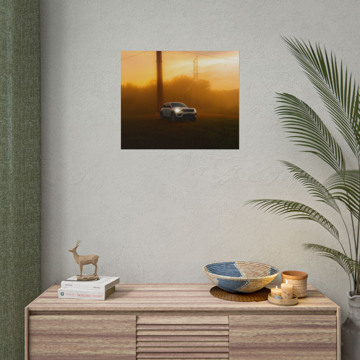 Jeep Grand Cherokee in silver color driving through warm, hazy sunset fog with amber light and distant power lines