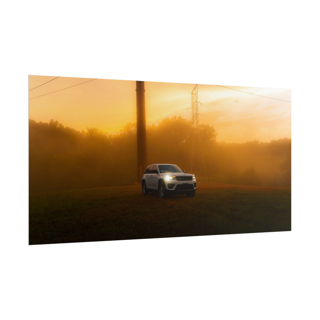 Jeep Grand Cherokee in white driving through warm sunset fog with glowing headlights and power lines in background