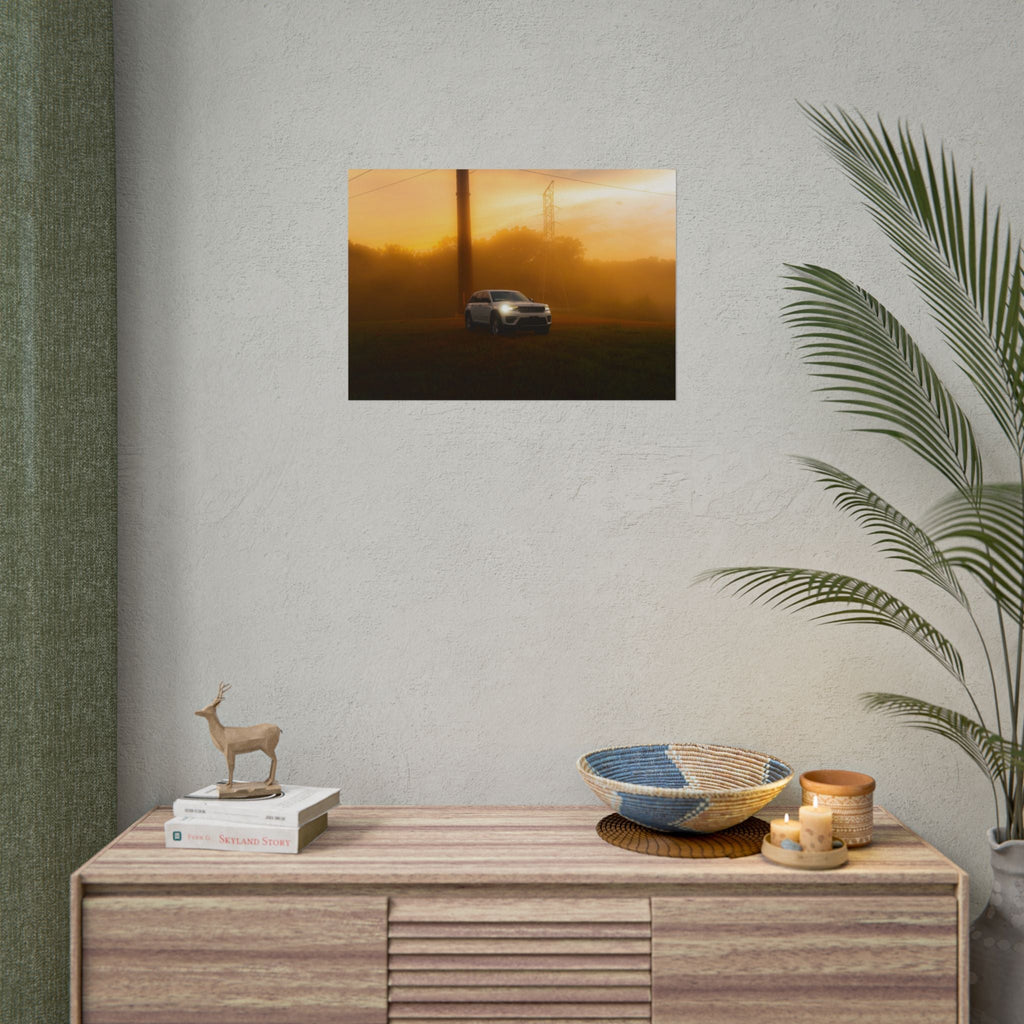 Jeep Grand Cherokee poster featuring a silver SUV driving through warm, hazy amber sunset fog with power lines
