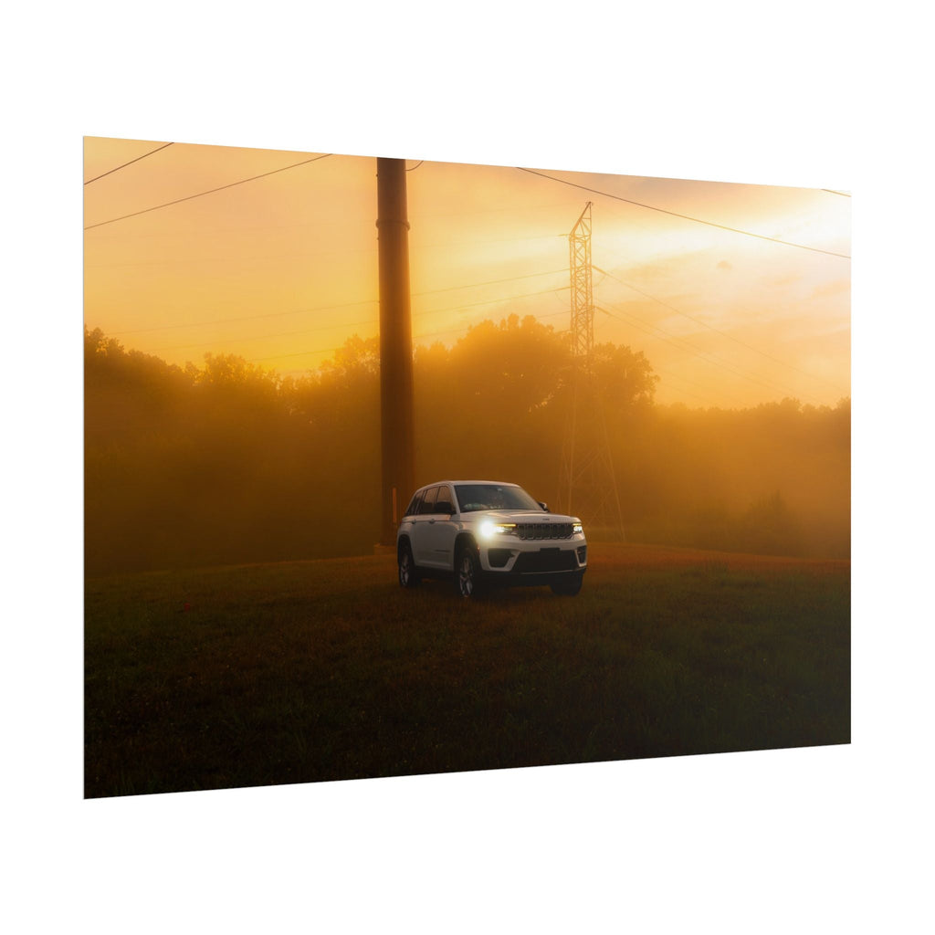 Jeep Grand Cherokee white SUV driving through a foggy field at sunset with warm amber light and power lines