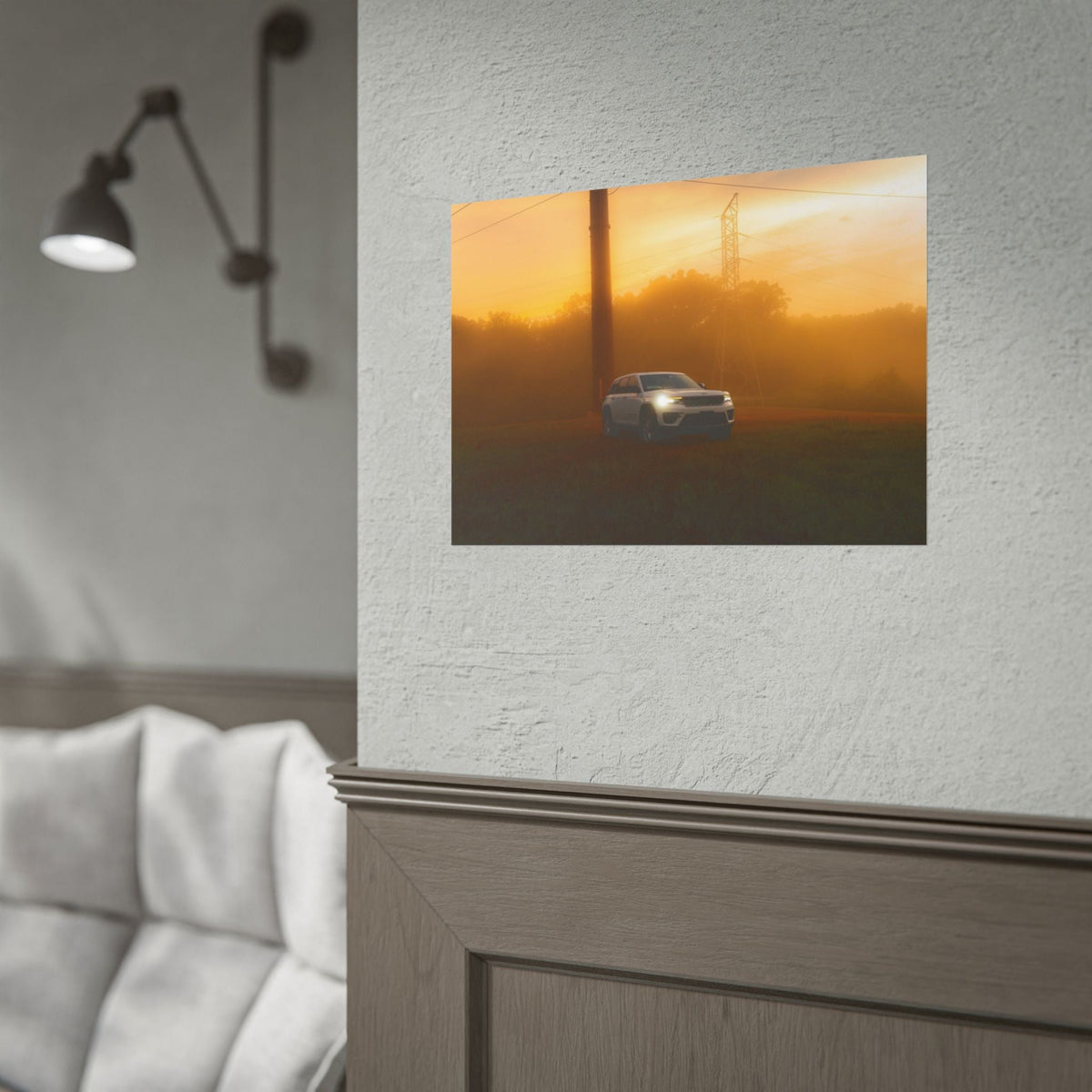 Jeep Grand Cherokee white SUV driving through warm, hazy sunset fog with amber light surrounding headlights