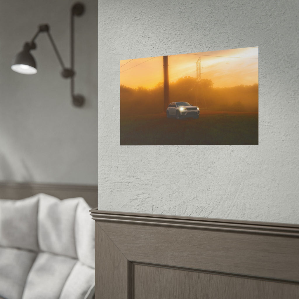 Jeep Grand Cherokee white SUV driving through warm orange sunset fog with power lines and misty background